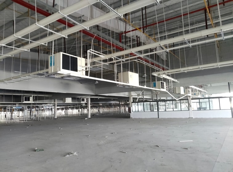 大型制衣工廠車間降溫安裝蒸發(fā)冷省電空調-臥式軸流機組